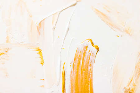 Art, branding and glamour concept - Artistic abstract texture background, golden acrylic paint brush stroke, textured ink oil splash as print backdrop for luxury holiday brand, flatlay banner designの写真素材