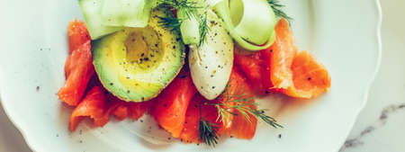 Lunch, restaurant and diet concept - Fresh salmon salad with avocado and creamy mascarpone cheese flat lay, table flatlay, top view food photography and recipe inspiration for cooking blog or cookbookの写真素材