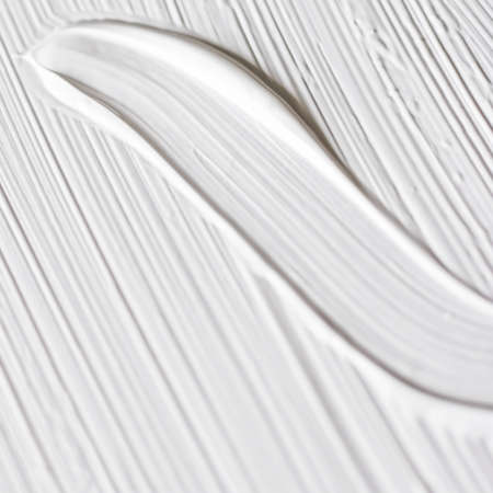 Art, branding and makeup concept - Cosmetics abstract texture background, white acrylic paint brush...