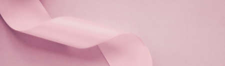 Branding, holidays and luxe brands concept - Abstract silk ribbon on blush pink background,...