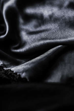 Fashion brand, elegant fabric and luxe beauty concept - Luxury black soft silk flatlay background texture, holiday glamour abstract backdropの写真素材