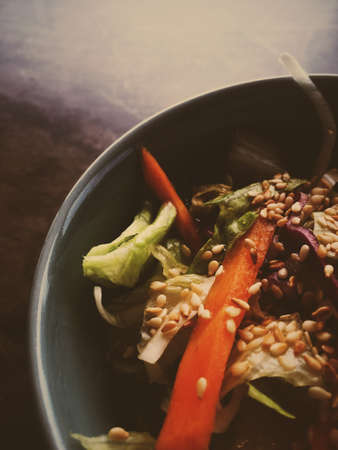 Vegan dieting, eating out and oriental cuisine concept - Vegetarian asian vegetable salad served in...