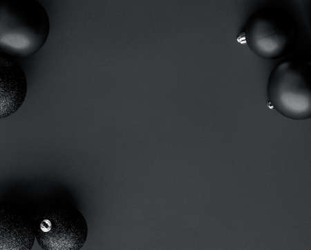 Gift decor, New Years Eve and happy celebration concept - Christmas baubles on black flatlay backdrop, luxury winter holiday card backgroundの写真素材