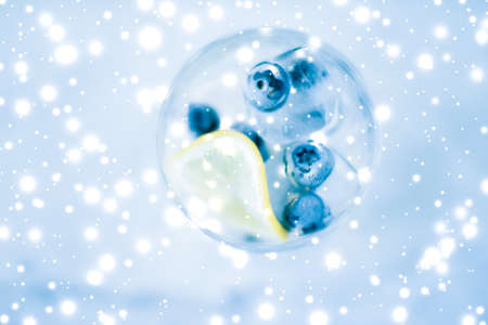 Cold icy drink, luxury bar and New Years Eve party celebration concept - Winter holiday cocktail...