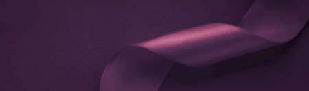 Branding, holidays and luxe brands concept - Abstract curly silk ribbon on purple background,...