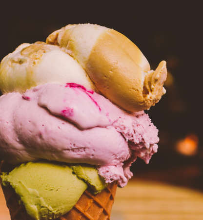 Delicious gelato, organic dairy and homemade recipe concept - Ice cream cone melting outdoors in summer, sweet dessert food on holidayの写真素材