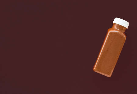 Diet menu, dieting program, and juice catering concept - Detox superfood smoothie chocolate bottle for weight loss cleanse on
brown background, flatlay design for food and nutrition expert blogの写真素材