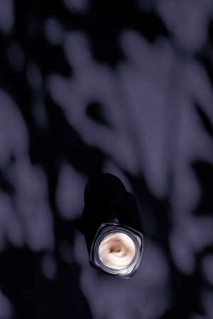 Anti-age moisturizer, luxe cosmetics and organic science concept - Moisturizing beauty face cream for sensitive skin, luxury spa cosmetic and natural clean skincare product on purple backgroundの写真素材