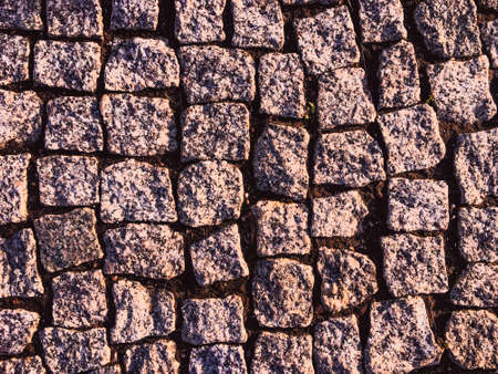 Tiles, road and paving concept - Old rustic stone pavement textured background, architectural detail...