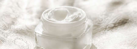 Face cream moisturizer in a jar and serum gel bottle, luxury skincare cosmetics and organic anti-aging product for health and beauty brandの写真素材