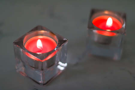 Aromatic candles for romantic atmosphere at home, interior and decor close-upの写真素材