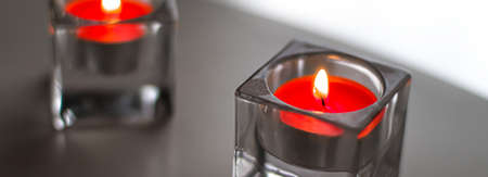 Aromatic candles for romantic atmosphere at home, interior and decor close-upの写真素材