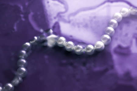Pearl jewellery under water surface, fashion and luxury conceptの写真素材