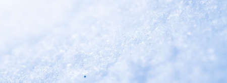 Snow texture as winter and holiday season background, macro