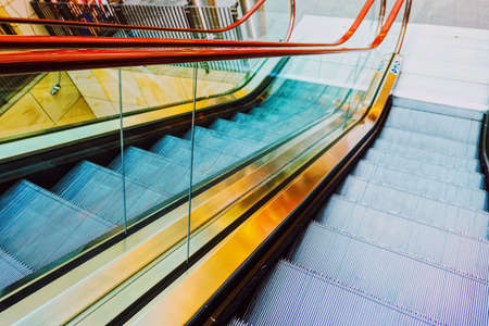 Escalator in a downtown shopping center, metropilitan city areaの写真素材