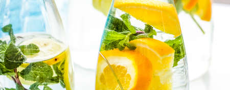 Fruit-flavoured water or soda drinks served at charity event, close-up