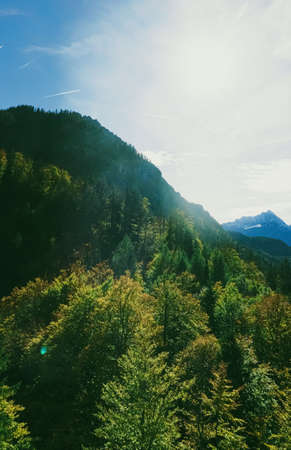 Beautiful nature of European Alps, landscape view of alpine mountains, lake and village in spring season, travel and destination sceneryの写真素材