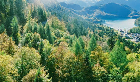 Beautiful nature of European Alps, landscape view of alpine mountains, lake and village in spring season, travel and destination sceneryの写真素材