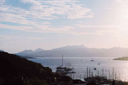 Beautiful sea view and mountains in the Mediterranean at sunset, summer vacation travel and holiday destinationの写真素材