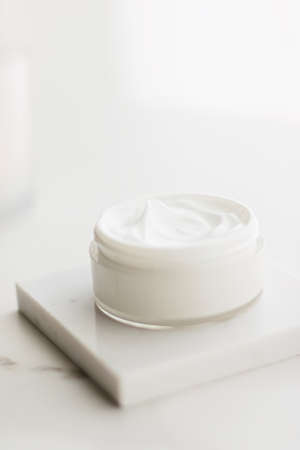 Face cream moisturizer in a jar, luxury skincare cosmetics and anti-aging product for healthy skin and beauty routineの写真素材