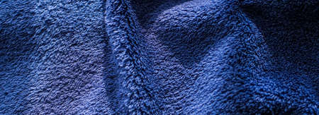 Premium blue fabric texture, decorative textile as background for interior design, close-upの写真素材