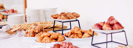 Pastry buffet served at charity event, sweet food and dessert table settingの写真素材
