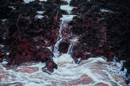 Storm in the ocean, sea waves crashing on rocks on the beach coast, nature and waterscape scenery