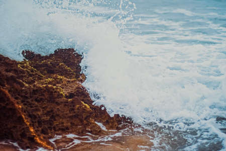 Storm in the ocean, sea waves crashing on rocks on the beach coast, nature and waterscape sceneryの写真素材
