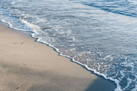 Beautiful sea or ocean waves, coast view from tropical sand beach, summer vacation travel and holiday destination sceneの写真素材