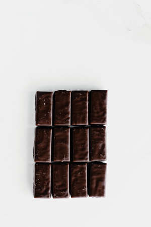Dark chocolate candies isolated on white background, sweet food and tasty dessert