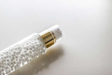 Serum gel or make-up primer in bottle, luxury skincare cosmetics and organic anti-aging product for...