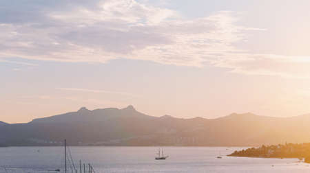 Beautiful sea view and mountains in the Mediterranean at sunset, summer vacation travel and holiday destinationの写真素材