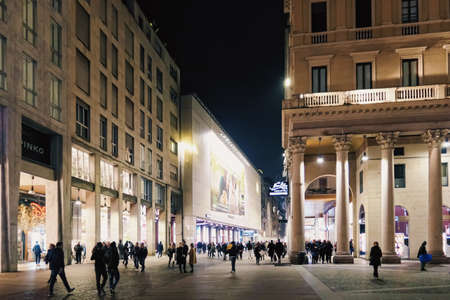 MILAN, ITALY circa January, 2020: Historical buildings on the city center streets of Milan in Lombardy region in Northern Italy at night, classic European architectureのeditorial素材