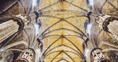 Milan, Italy circa January, 2020: Interior of Milan Cathedral known as Duomo di Milano, historical building and famous landmark in Lombardy region in Northern Italyのeditorial素材