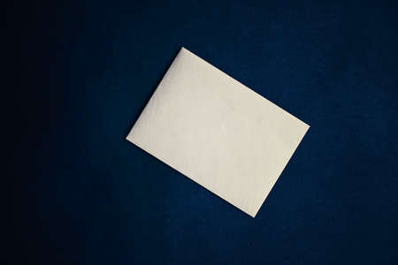 Blank beige paper card on blue background, premium business and luxury brand identity mockup