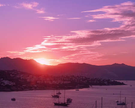 Beautiful sea view and mountains in the Mediterranean at sunset, summer vacation travel and holiday destinationの写真素材