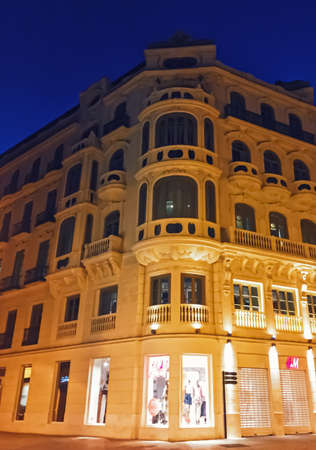 Malaga, Spain circa January, 2020: Streets of Malaga, the capital city of Andalucia region in Spain, Southern European architecture and historical buildings at nightのeditorial素材