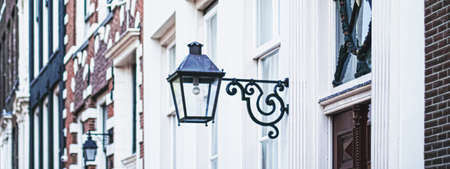 Architectural detail of a building on the main city center street of Amsterdam in Netherlands, european architectureの写真素材