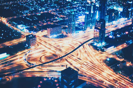 Aerial night view of Dubai in United Arab Emirates, metropolitan cityscape sceneryの写真素材
