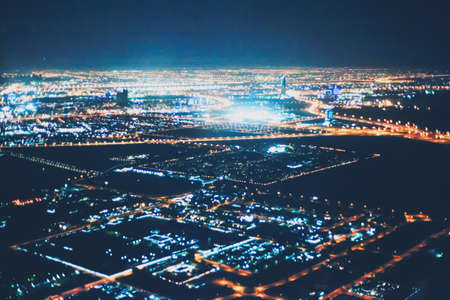 Aerial night view of Dubai in United Arab Emirates, metropolitan cityscape sceneryの写真素材