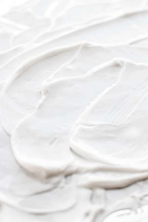 Skincare cosmetics and cream product texture or antibacterial liquid soap for hand washing for virus protection and hygiene, top viewの写真素材