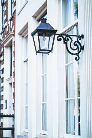 Architectural detail of a building on the main city center street of Amsterdam in Netherlands, european architectureの写真素材