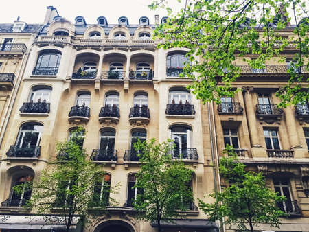 Paris, France circa January, 2020: Parisian architecture and historical buildings, restaurants and boutique stores on streets of Paris, Franceのeditorial素材