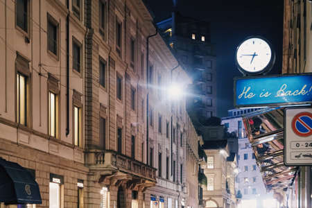 Milan, Italy circa January, 2020: Historical buildings, stores and boutique shops on Via Montenapoleone street in Milan at night, luxury shopping streetのeditorial素材