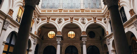 Milan, Italy circa January, 2020: Classic European architecture and historical buildings on the city center streets of Milan in Lombardy region in Northern Italyのeditorial素材