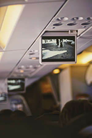 Algarve, Portugal circa January 2020: Tv screen in the airplane, travel and telecommunication conceptのeditorial素材
