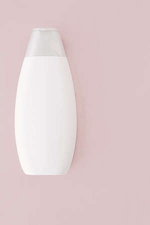 Blank label shampoo bottle or shower gel on pink background, beauty product and body care cosmetics,...