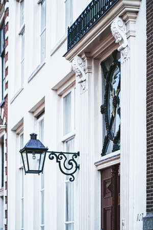 Amsterdam, Netherlands circa April 2020: Architectural detail of a building on the main city center street of Amsterdam in Netherlandsのeditorial素材