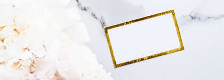 Glamorous business card or invitation mockup and bouquet of peony flowers, wedding and event branding designの写真素材