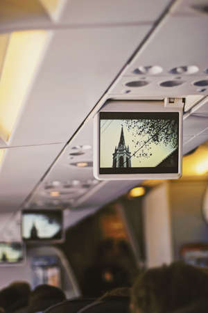 Warsaw, Poland circa January 2020: Tv screen in the airplane, travel and telecommunication concept